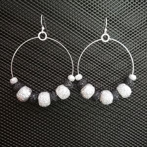 Silver and black sparkle hoop earrings